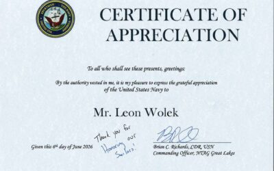 U.S. Navy presents Leon Wolek with Certificate of Appreciation